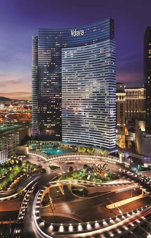 A modern high-rise building with the name 'Vdara' prominently displayed.