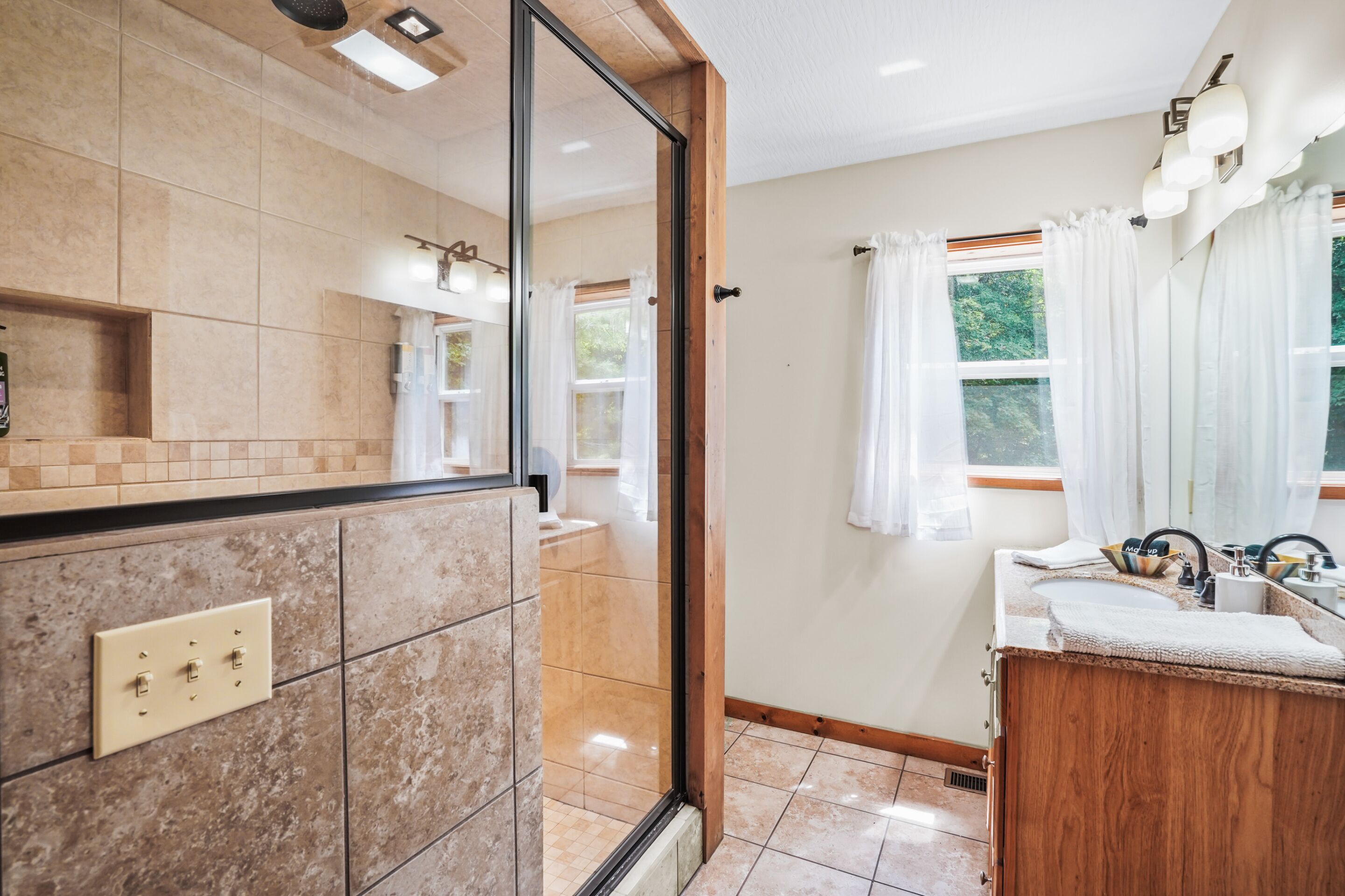 Bathtub, towels, soap, toilet paper