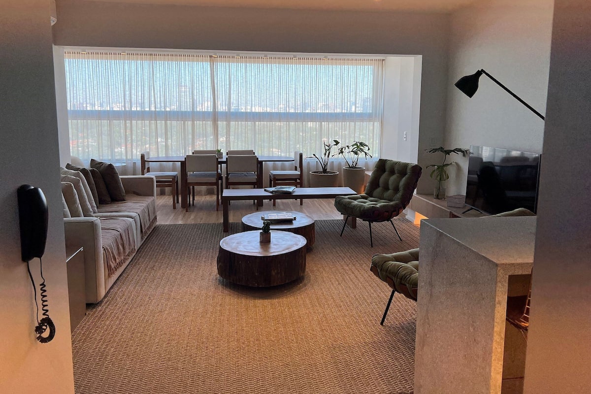 Apartment | Living area | 32-inch Smart TV with cable channels