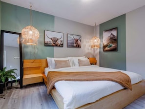 2 habitaciones, tabla de planchar con plancha y cuna de viaje