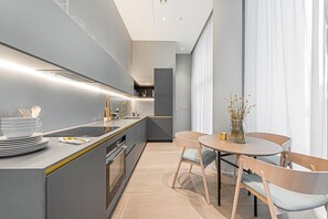 Fridge, microwave, oven, stovetop - The Cut- Stylish Family Home by Riverside (London)