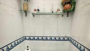 Shower, towels, soap, shampoo