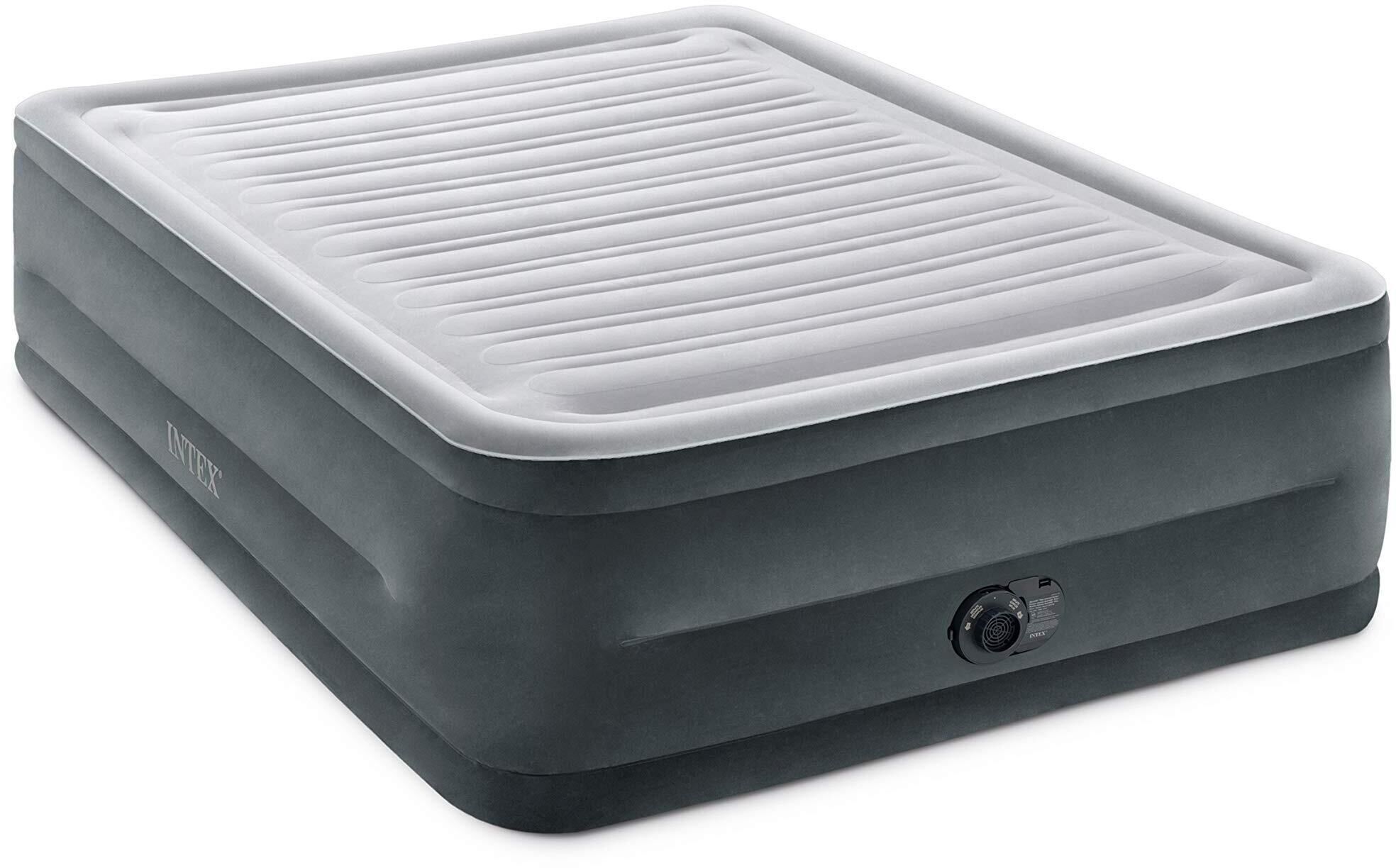 A gray portable air mattress with a textured surface and a control panel on the side.