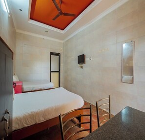 Deluxe Quadruple Room | Egyptian cotton sheets, premium bedding, desk, free WiFi - sagar Residency (Bahur)