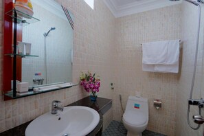 Dutxa, bidet, tovalloles i sabó 