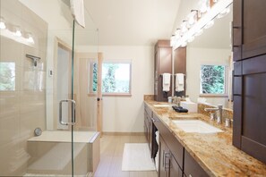 Shower, hair dryer, towels, shampoo
