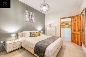 2 bedrooms, desk, iron/ironing board, travel cot