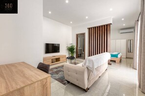 1 bedroom, desk, iron/ironing board, travel crib