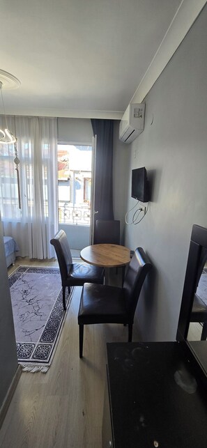 Premium Apartment, Balcony | Living area | 32-inch LED TV with satellite channels - Taksim Millennium Suites (Istanbul)