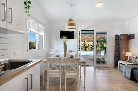 Dining. Holiday Home 'Villa Tino- Casa M' with Mountain Views, Shared Pool & Wi-Fi