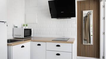 Fridge, microwave, stovetop, coffee/tea maker