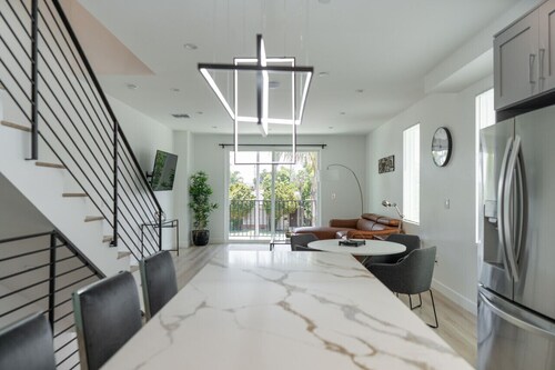 MODERN 3-4 BR TOWNHOME BUILT 2023 w/ OFFICE, BONUS ROOM, GARAGE & EV CHARGER p64