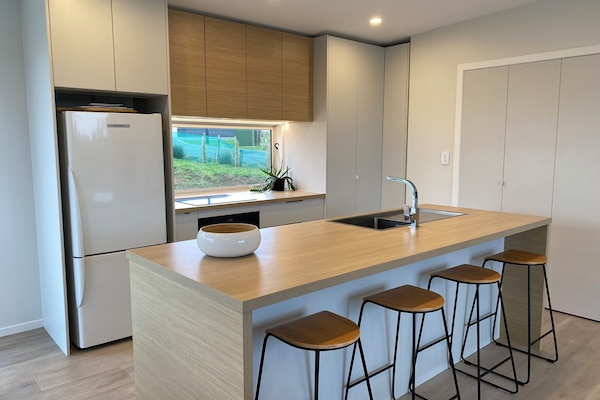 The kitchen (and laundry in the cupboards to the right)
