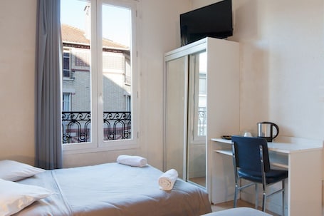 Basic Single Room | Memory foam beds, individually decorated, individually furnished, desk