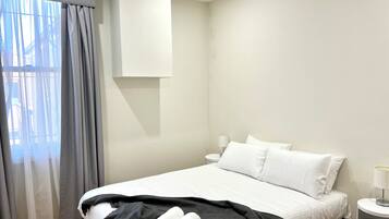 Deluxe Townhome | 4 bedrooms, Egyptian cotton sheets, premium bedding, desk