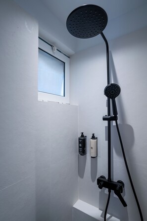 Basic Double or Twin Room | Bathroom | Shower, hydromassage showerhead, hair dryer, bathrobes - Seaside Living (Zakynthos)