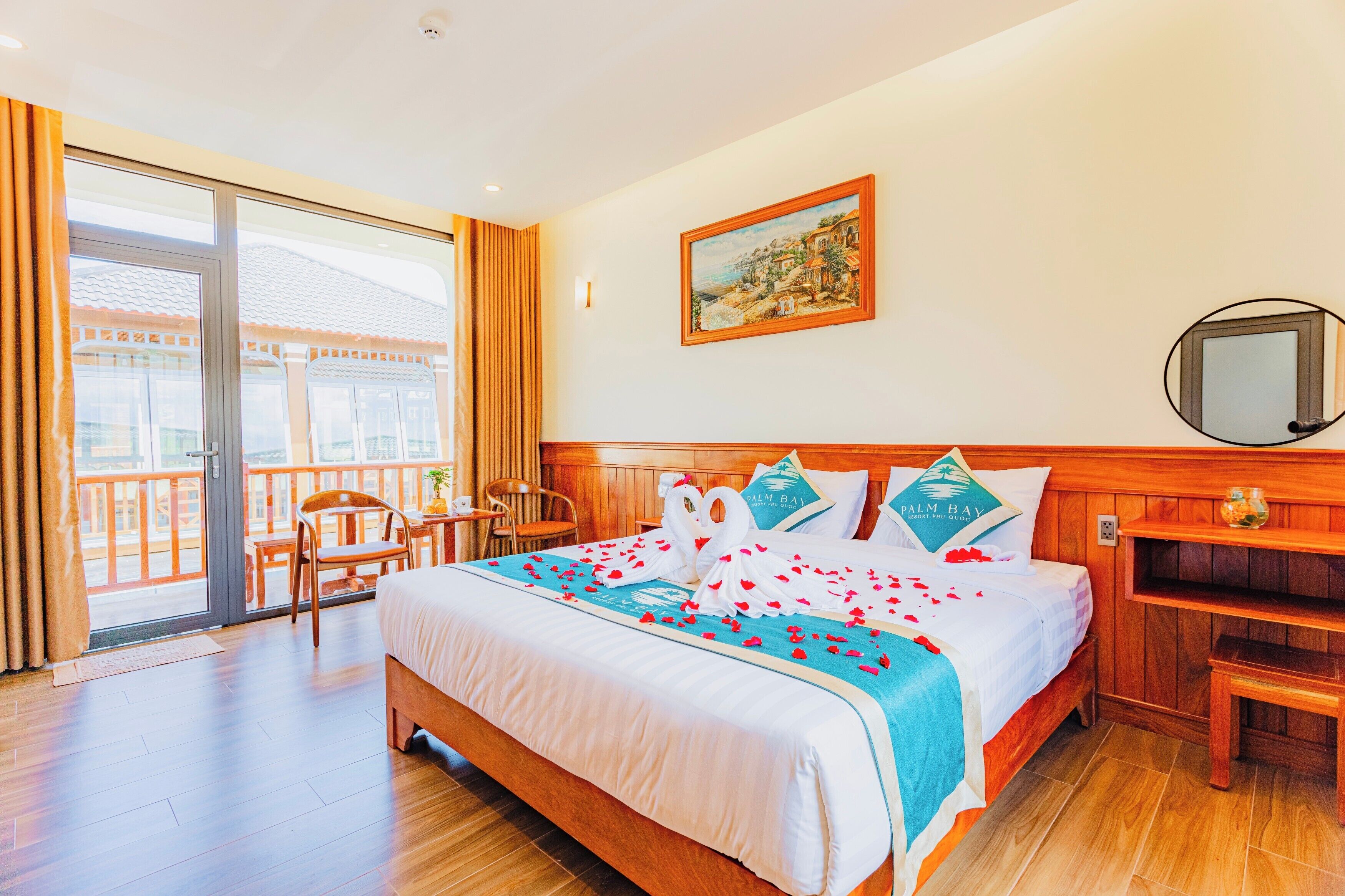 deluxe double room, 1 queen bed, balcony, pool view | minibar, desk, laptop workspace, blackout curtains