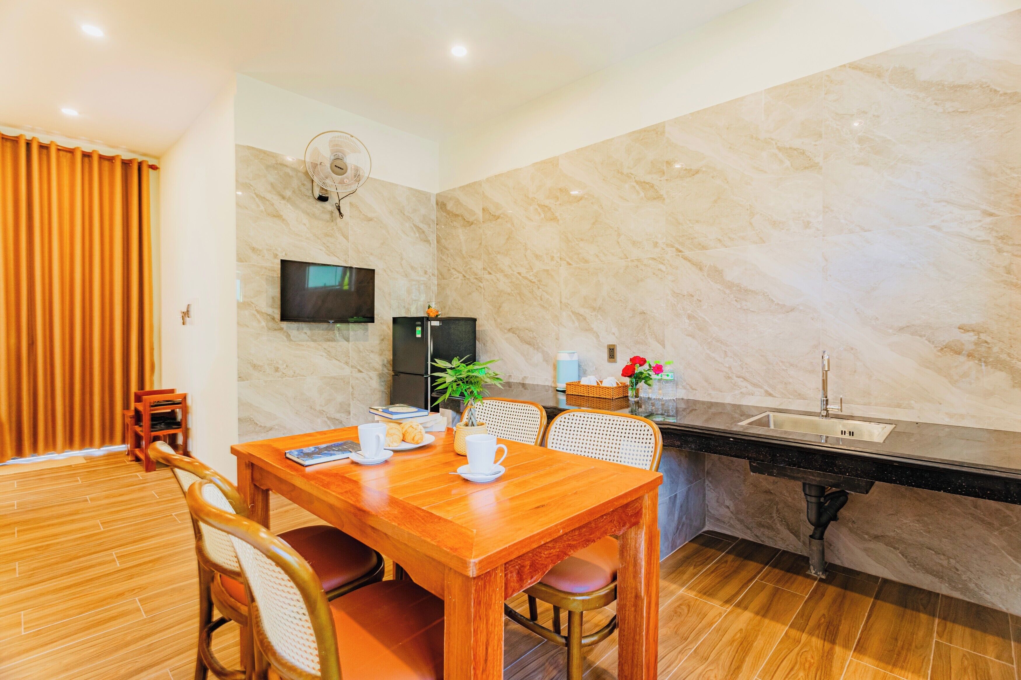 junior suite | living room | 30-inch flat-screen tv with cable channels, tv