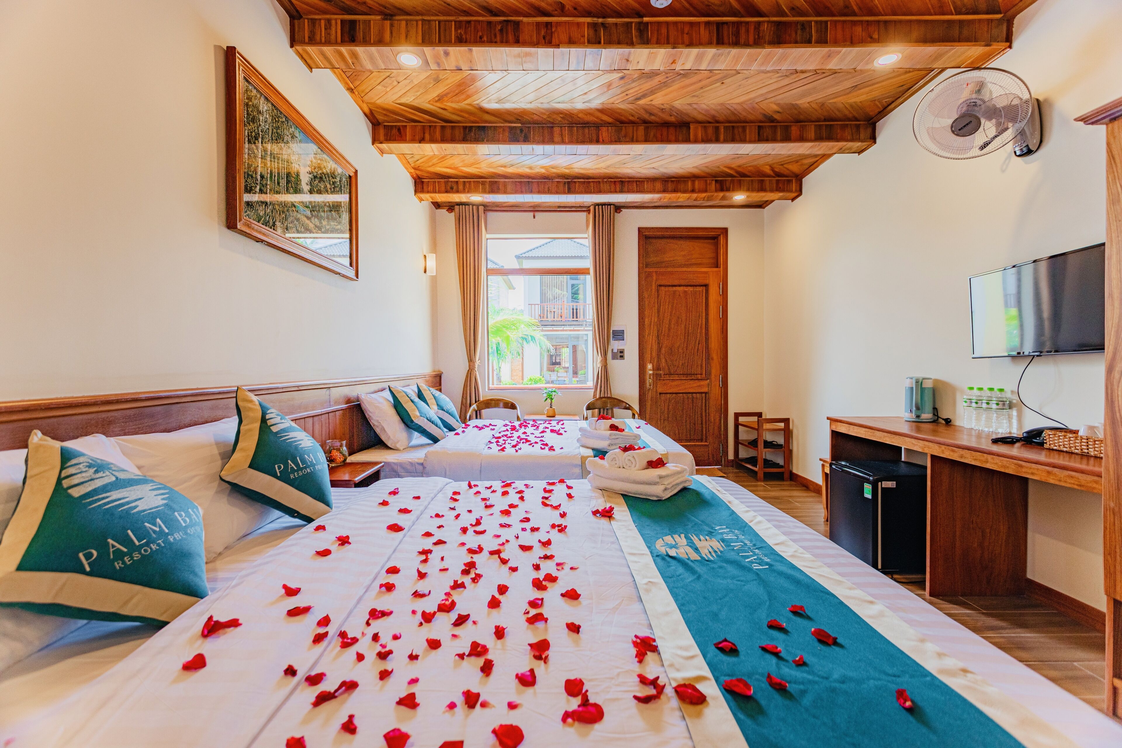 family room, balcony, pool view | minibar, desk, laptop workspace, blackout curtains