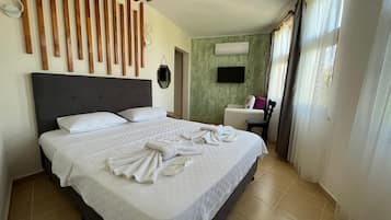 Minibar, wifi gratis y ropa de cama