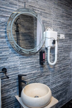 Hair dryer, bidet, towels, soap