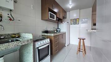 Apartamento | Cozinha privada | Geladeira, micro-ondas, liquidificador