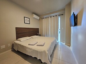 Apartamento conforto | 1 quarto, Wi-Fi de cortesia, roupa de cama
