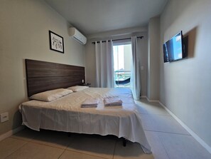Apartamento conforto | 1 quarto, Wi-Fi de cortesia, roupa de cama