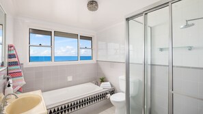 Bathtub, hair dryer, towels