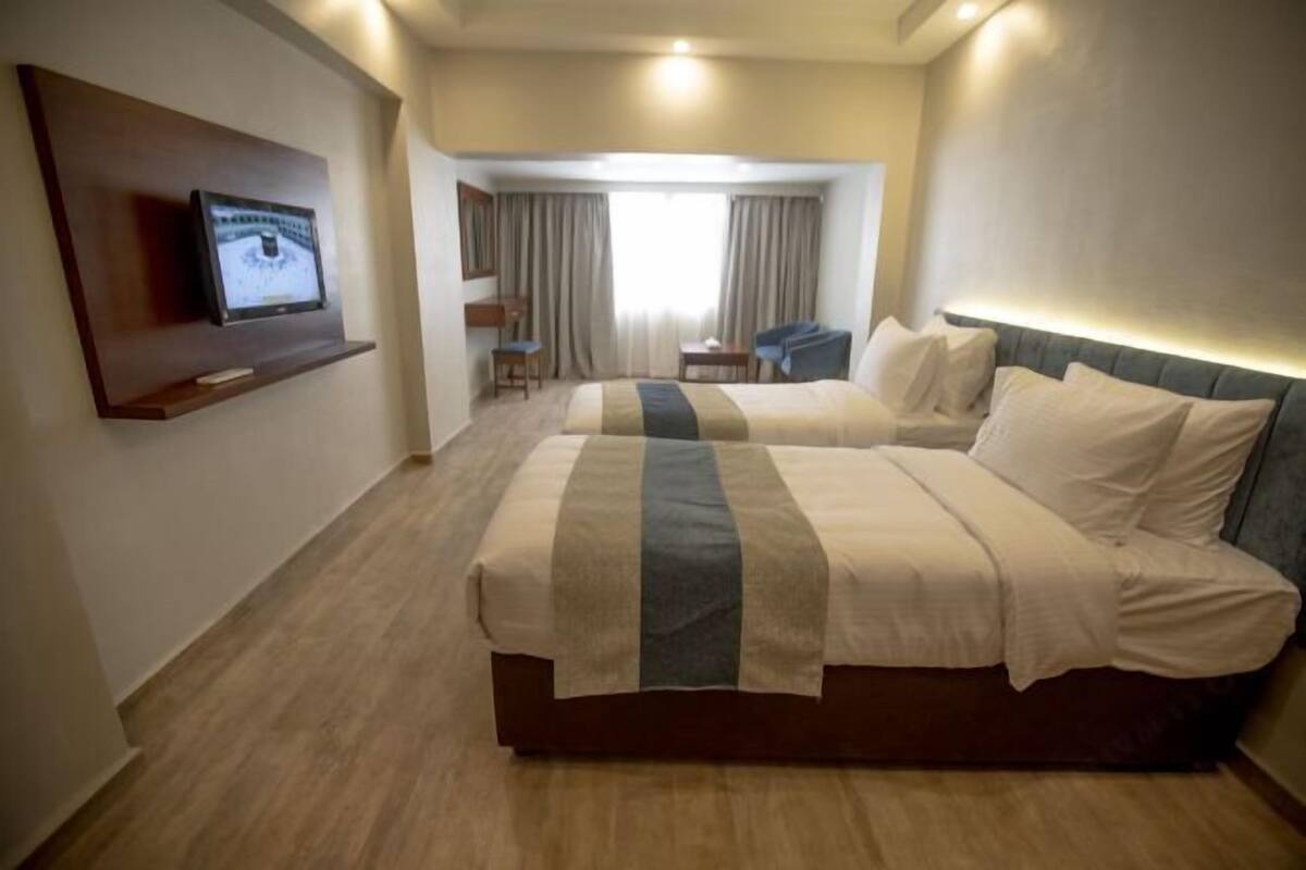 Minibar, iron/ironing board (on request), WiFi (free), bed sheets