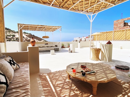 Outdoor dining. Entire house with private roof terrace