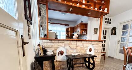 The house is located in the central square of the historical village Kynidaros