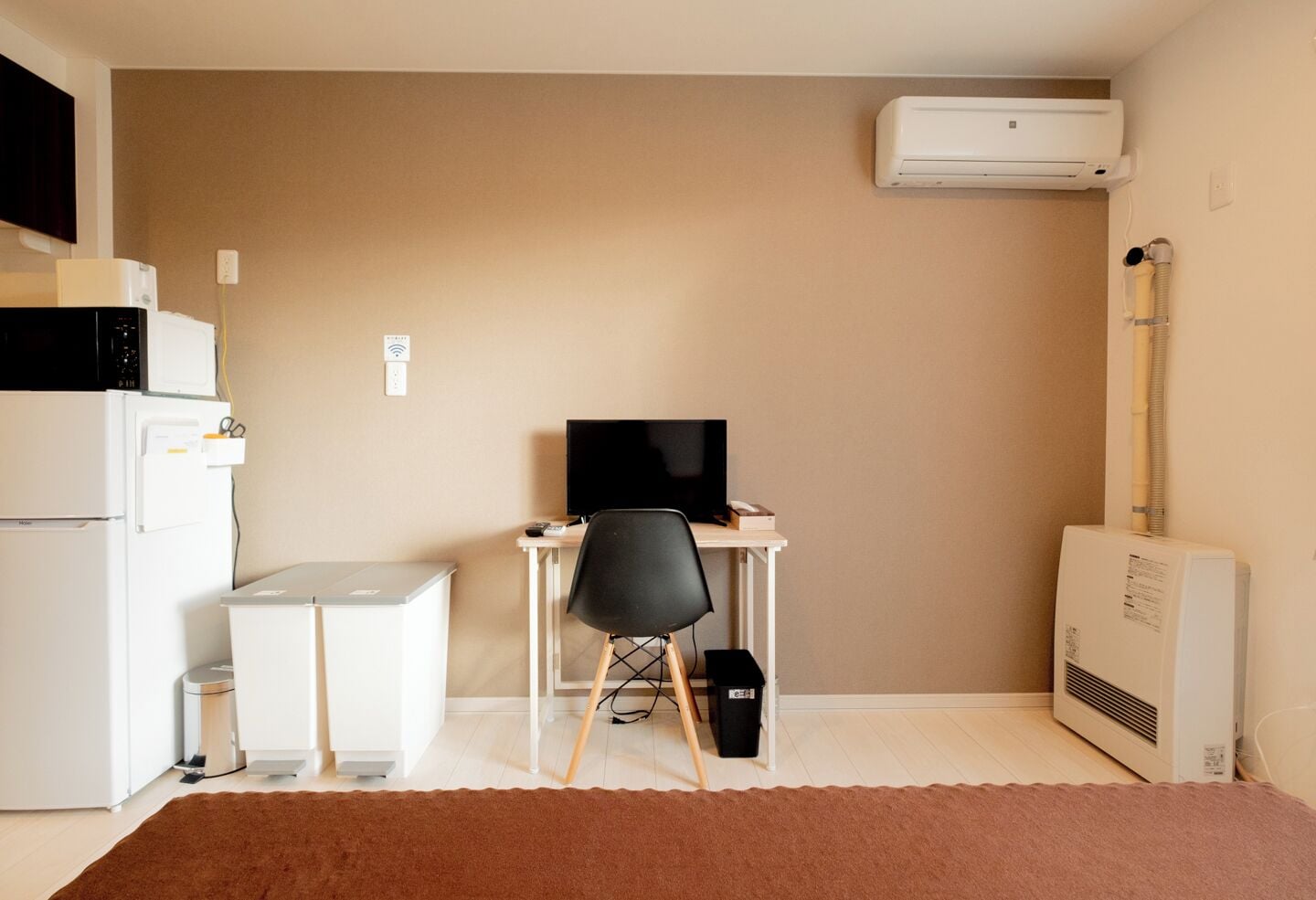 Desk, laptop workspace, blackout drapes, iron/ironing board