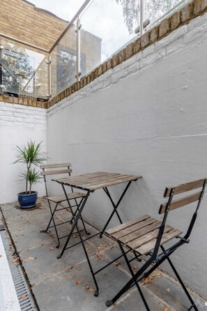 Appartement, 2 lits doubles | Terrasse/Patio