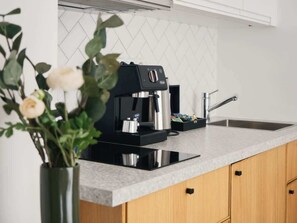 Fridge, microwave, stovetop, coffee/tea maker