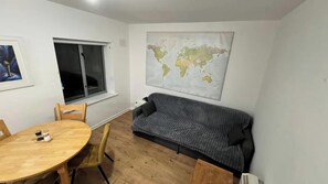 Appartement, plusieurs lits | Coin séjour