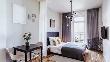1 habitación, tabla de planchar con plancha, cuna de viaje y wifi