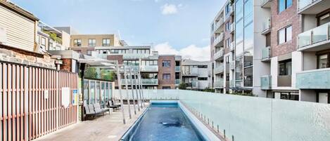 Basic Apartment, 1 King Bed | Pool | A heated pool