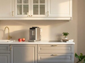 Fridge, microwave, stovetop, coffee/tea maker