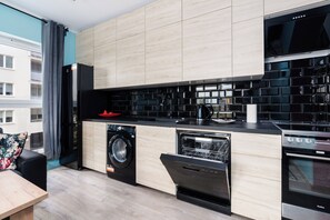 Apartment, 1 Bedroom, Balcony | Private kitchen | Oven, dishwasher, cookware/dishes/utensils, freezer