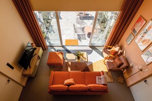 Deluxe appartement, terras, aan tuin | 2 slaapkamers, luxe beddengoed, een bureau, een laptopwerkplek