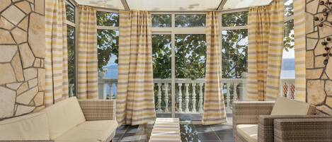 Family Apartment, Multiple Bedrooms (Seaview House Helena - Apartment 1) | Living area | 21-inch flat-screen TV with satellite channels, TV