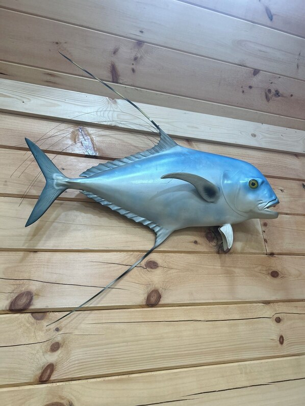 A fish mounted on a wooden wall. - Goin Fishin' Cabin # 4 (Campbellsville)