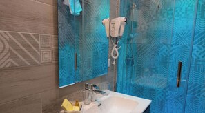 Shower, rainfall showerhead, designer toiletries, hair dryer