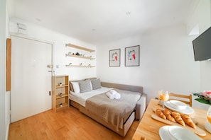 1 bedroom, desk, iron/ironing board, travel cot