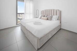 2 slaapkamers, een strijkplank/strijkijzer, reisbedje, wifi