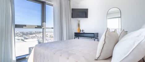 2 habitaciones, tabla de planchar con plancha, cuna de viaje y wifi