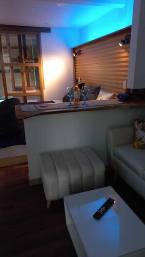 Deluxe Room | Living area | Flat-screen TV