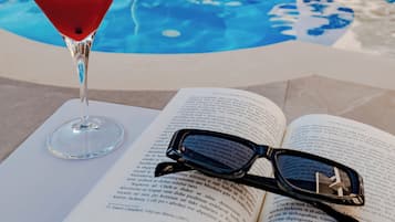 Seasonal outdoor pool, pool umbrellas, sun loungers