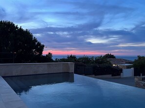 Outdoor pool, a heated pool - Comfortable 8-person villa with pool and sea view (LUMIO)